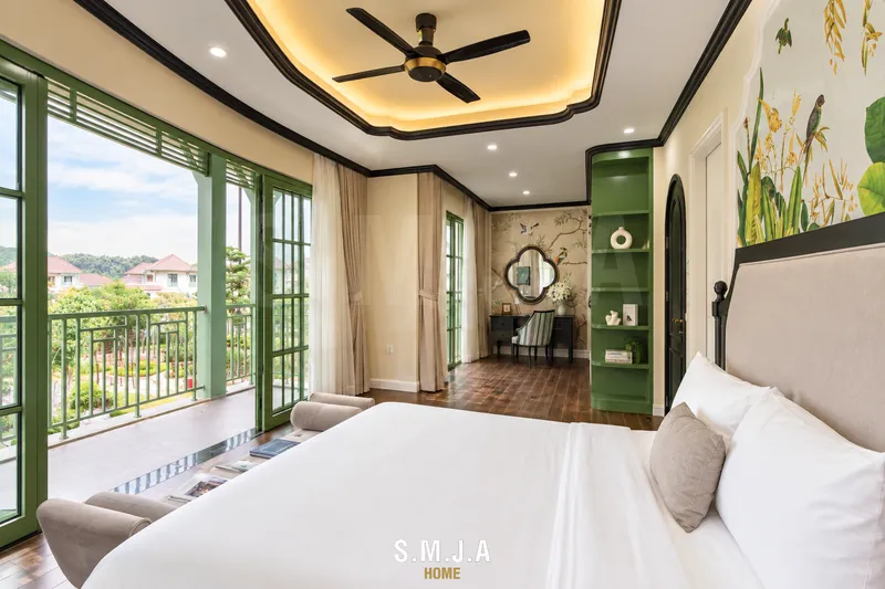 Phòng ngủ phong cách Indochine mở ra ban công thoáng rộng với hệ cửa kính khung xanh lớn
