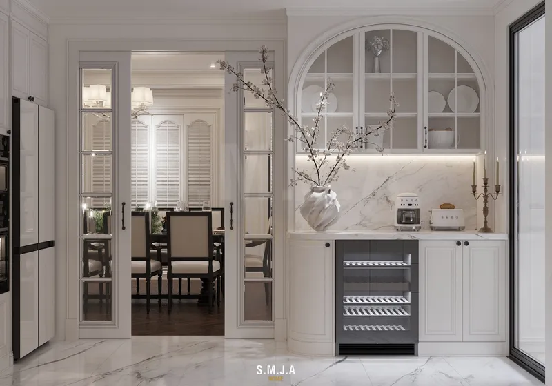 Không gian khu vực bếp phong cách tân cổ điển với tủ rượu âm tường và cửa kính lùa sang trọng