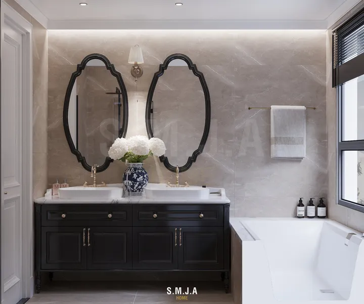 Không gian phòng tắm chung phong cách tân cổ điển với tủ lavabo đôi màu đen và bồn tắm nằm sang trọng.