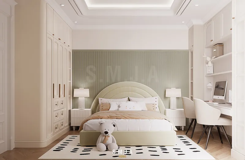 Thiết kế phòng ngủ trẻ em trong nhà phố 2 tầng với hệ tủ âm tường, góc học tập và giường ngủ bo cong hiện đại.